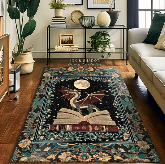 May include: A rectangular area rug with a dragon design. The rug features a black background with a dragon perched on an open book under a full moon. The border has a floral pattern with green, beige, and black colors. The text "INK & SHADOW Original Fine Art Rugs" is visible.