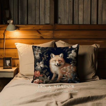 May include: A decorative pillow with a woven design featuring a red fox in a dark blue background with floral accents. The pillow reads "INK & SHADOW Original Fine Art Woven Pillow".