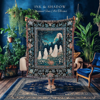 May include: A decorative throw blanket with a forest scene featuring white ghost figures under a full moon. The blanket has a black border with floral and leaf patterns. The text "INK & SHADOW Original Fine Art Throws" is at the top.