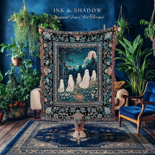 May include: A decorative throw blanket with a forest scene featuring white ghost figures under a full moon. The blanket has a black border with floral and leaf patterns. The text "INK & SHADOW Original Fine Art Throws" is at the top.