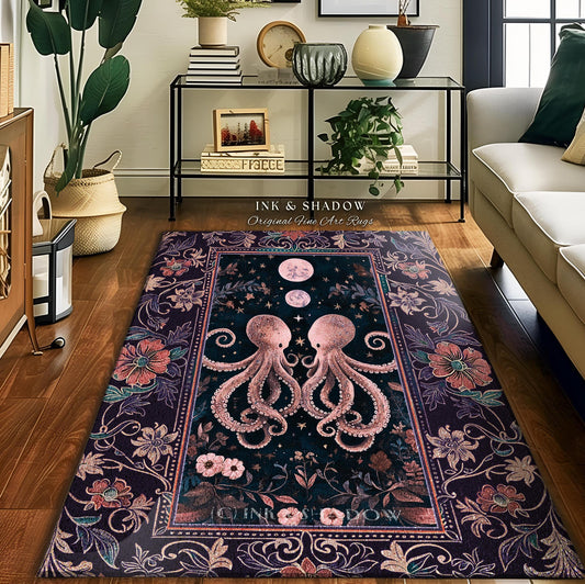 May include: A rectangular area rug with a dark background featuring two pink octopuses facing each other. The rug has a floral border with pink and purple flowers. The text "INK & SHADOW Original Fine Art Rugs" is visible.