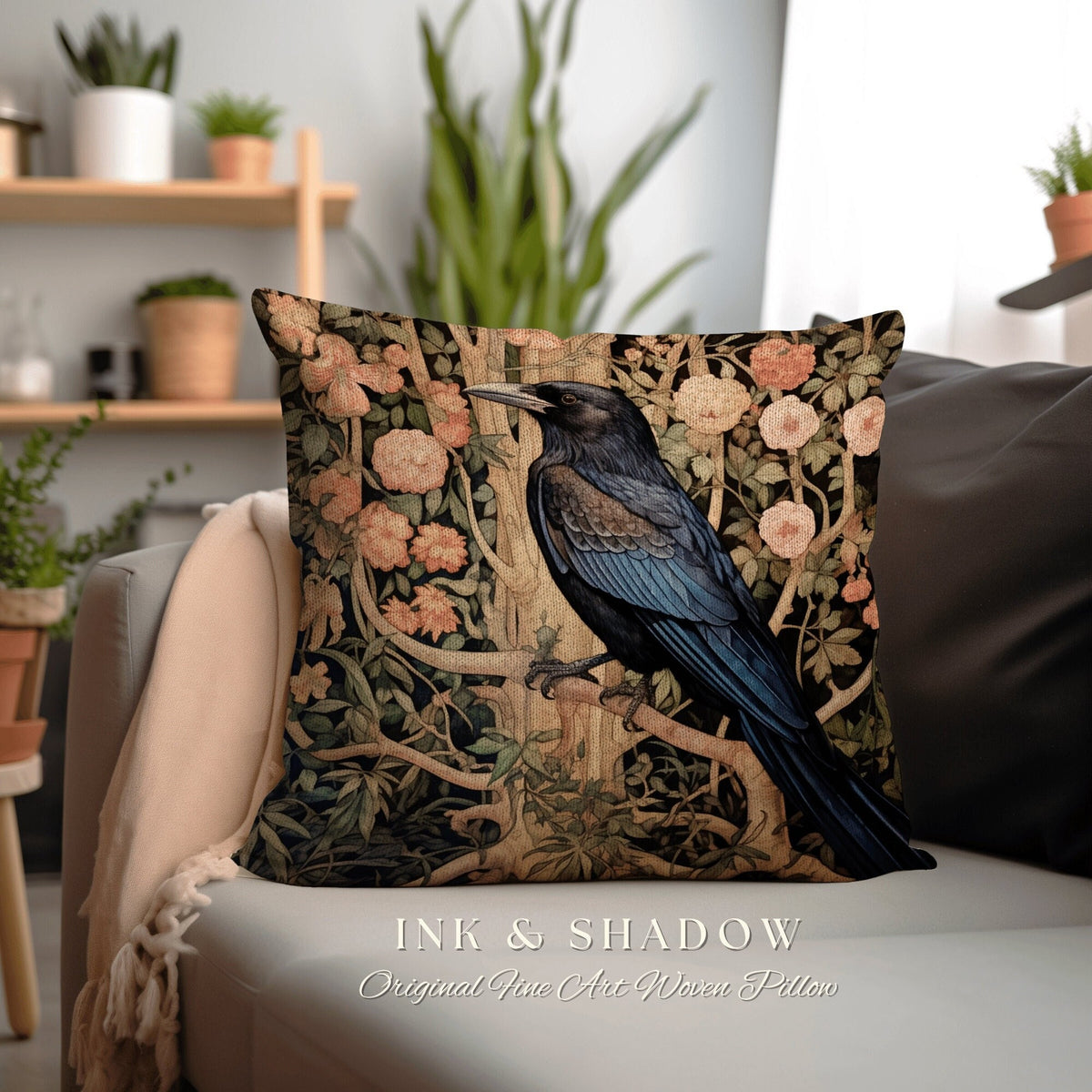 May include: A decorative throw pillow with a woven design featuring a black crow perched on a branch with pink flowers and green leaves. The pillow has the text "INK & SHADOW Original Fine Art Woven Pillow" printed on the bottom.