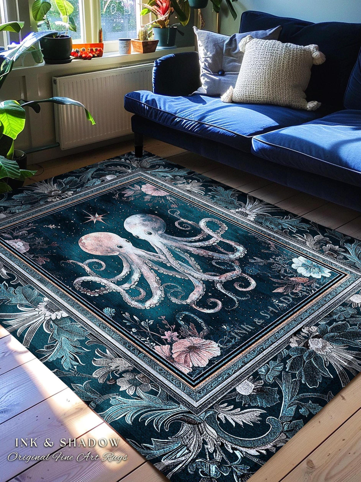May include: A rectangular area rug with a dark teal background features two octopuses in the center, surrounded by floral and botanical designs. The rug has a decorative border and the text "INK & SHADOW Original Fine Art Rugs".
