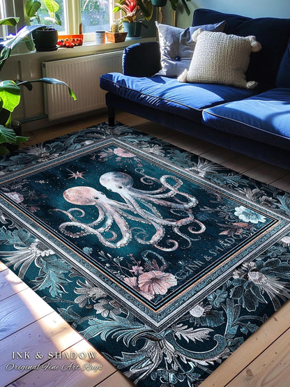 May include: A rectangular area rug with a dark teal background features two octopuses in the center, surrounded by floral and botanical designs. The rug has a decorative border and the text "INK & SHADOW Original Fine Art Rugs".