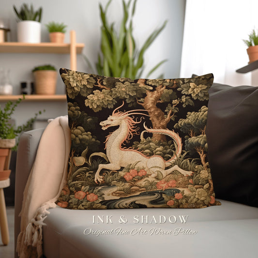 May include: Square woven pillow featuring a white mythical creature with a long tail, set against a dark forest backdrop with trees and flowers. The text "INK & SHADOW Original Fine Art Woven Pillow" is at the bottom.